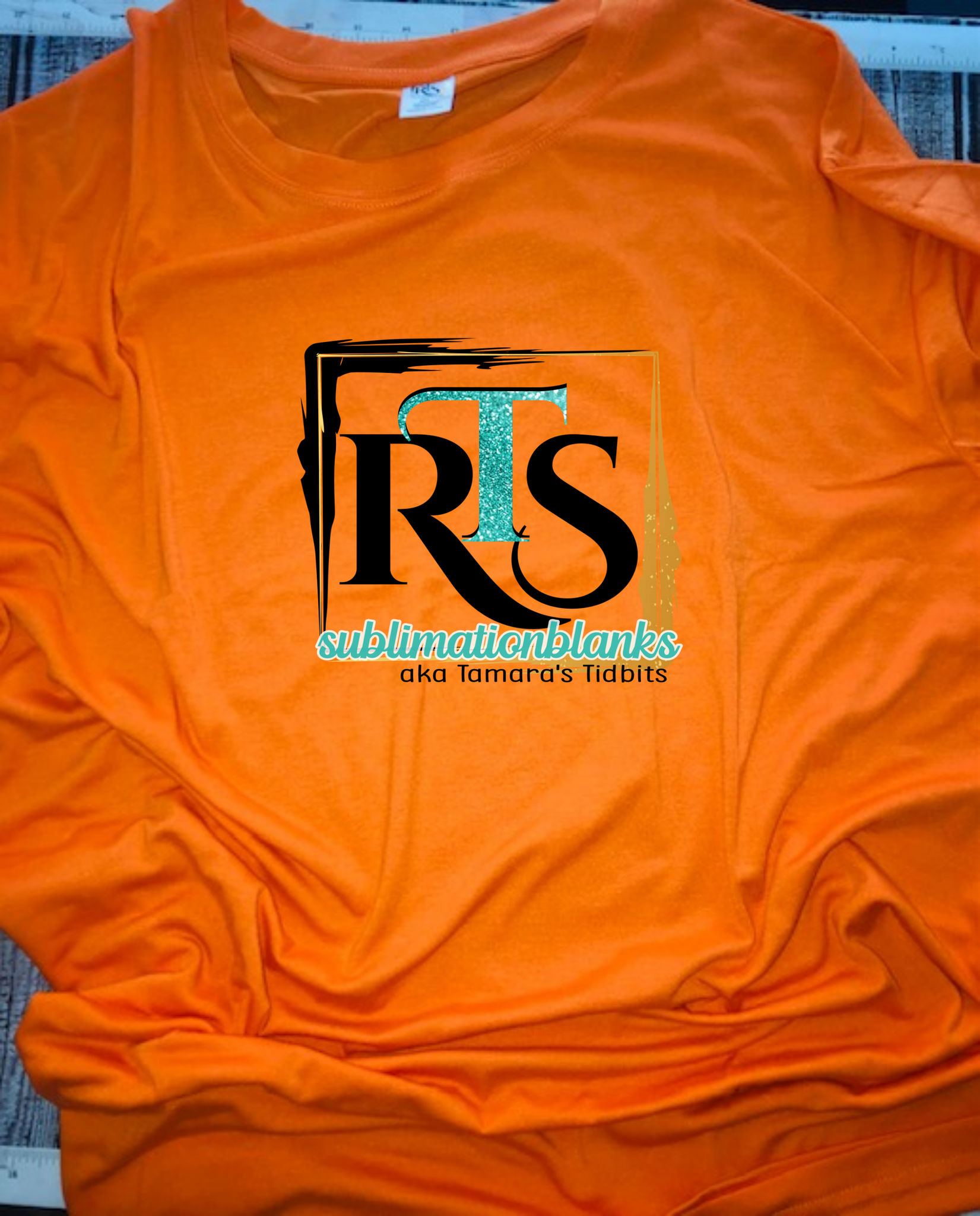 https://rtssublimationblanks.com/cdn/shop/products/orangeshirt_1024x1024@2x.png?v=1662220613